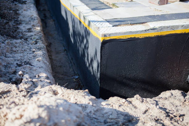 Professional Emergency Waterproofing technician working in Hebron, OH